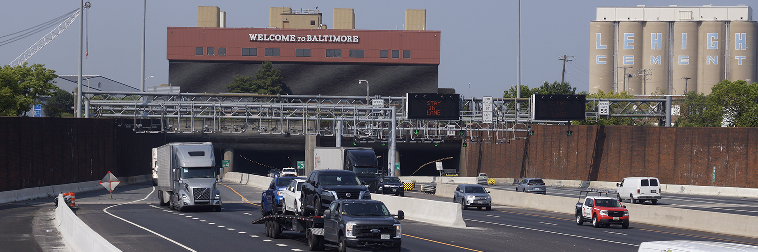 Fort McHenry Tunnel entrance with Toll Gantries over roadways.